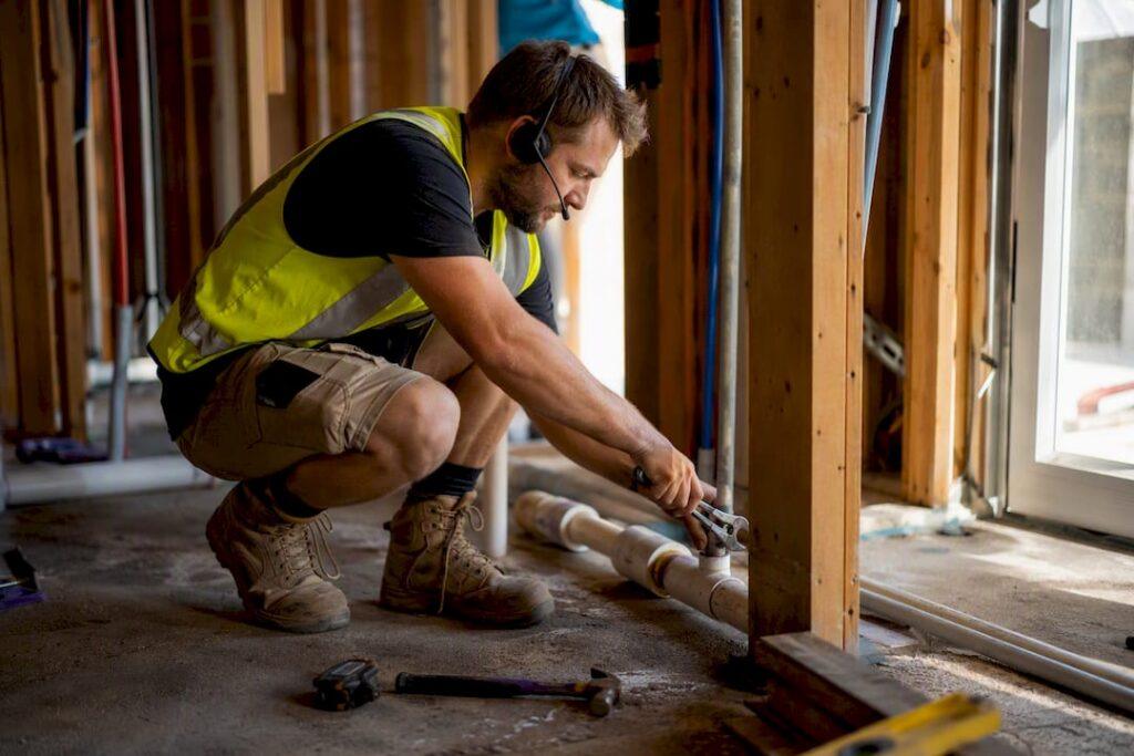 Tradie using headset while working onsite